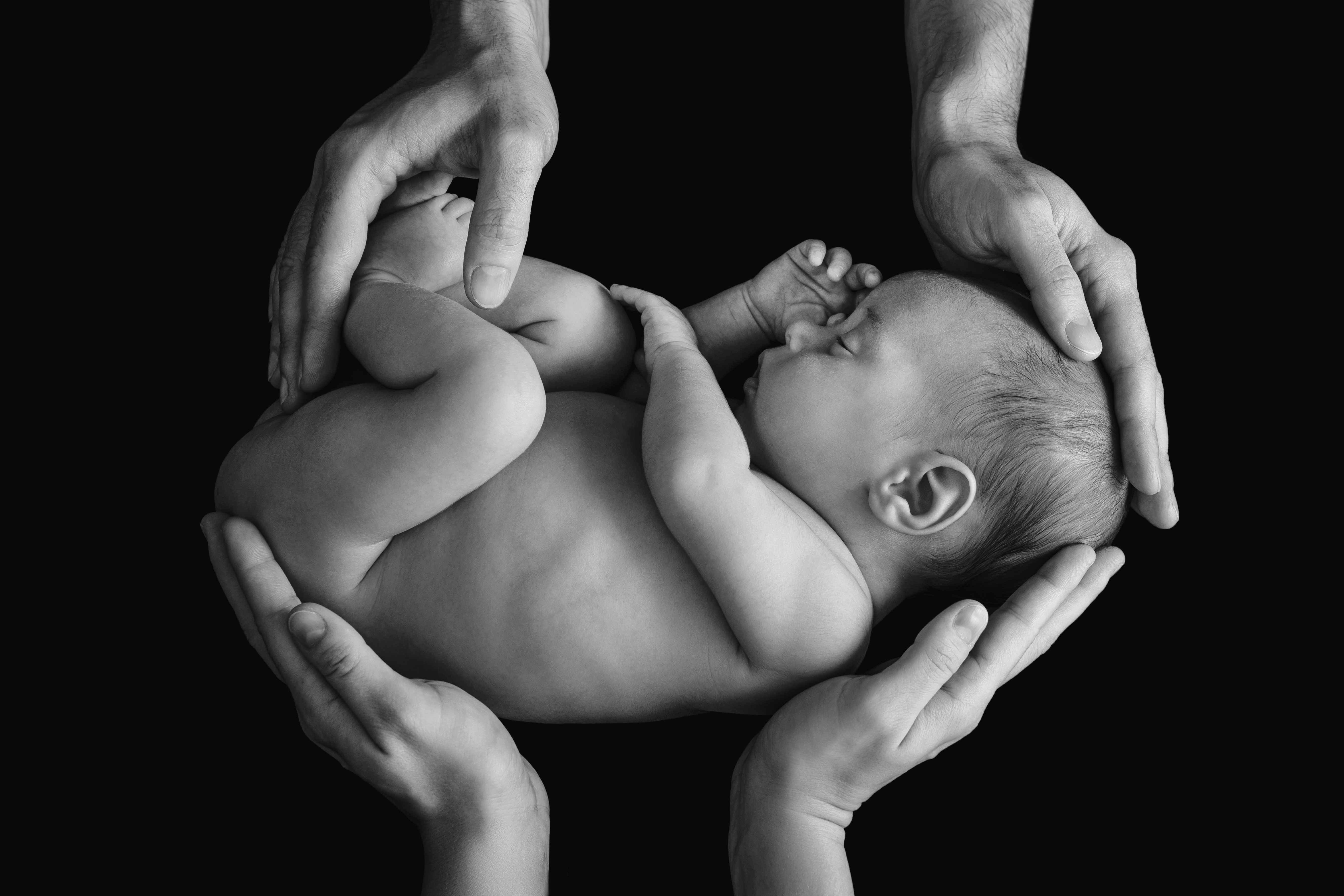 Sibling with newborn baby